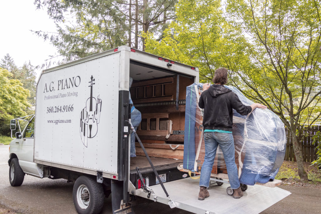 piano moving truck and grand piano